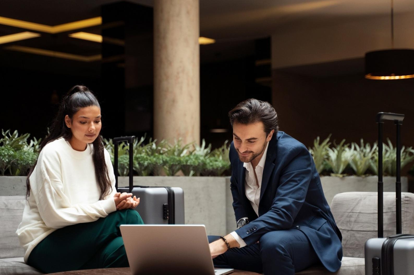 Small group learning session with participants reviewing financial documents together around a table