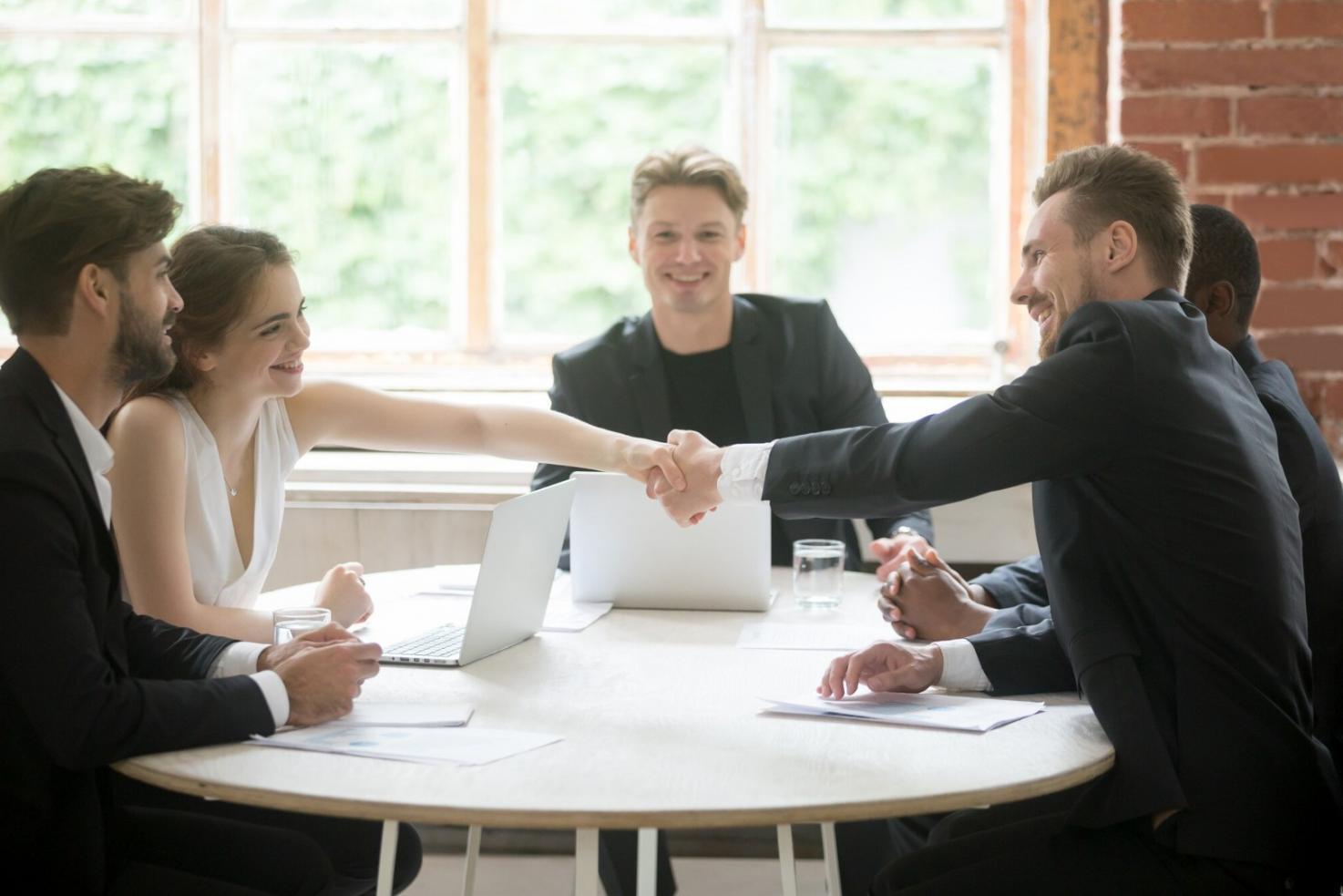 Team collaboration session reviewing financial strategies